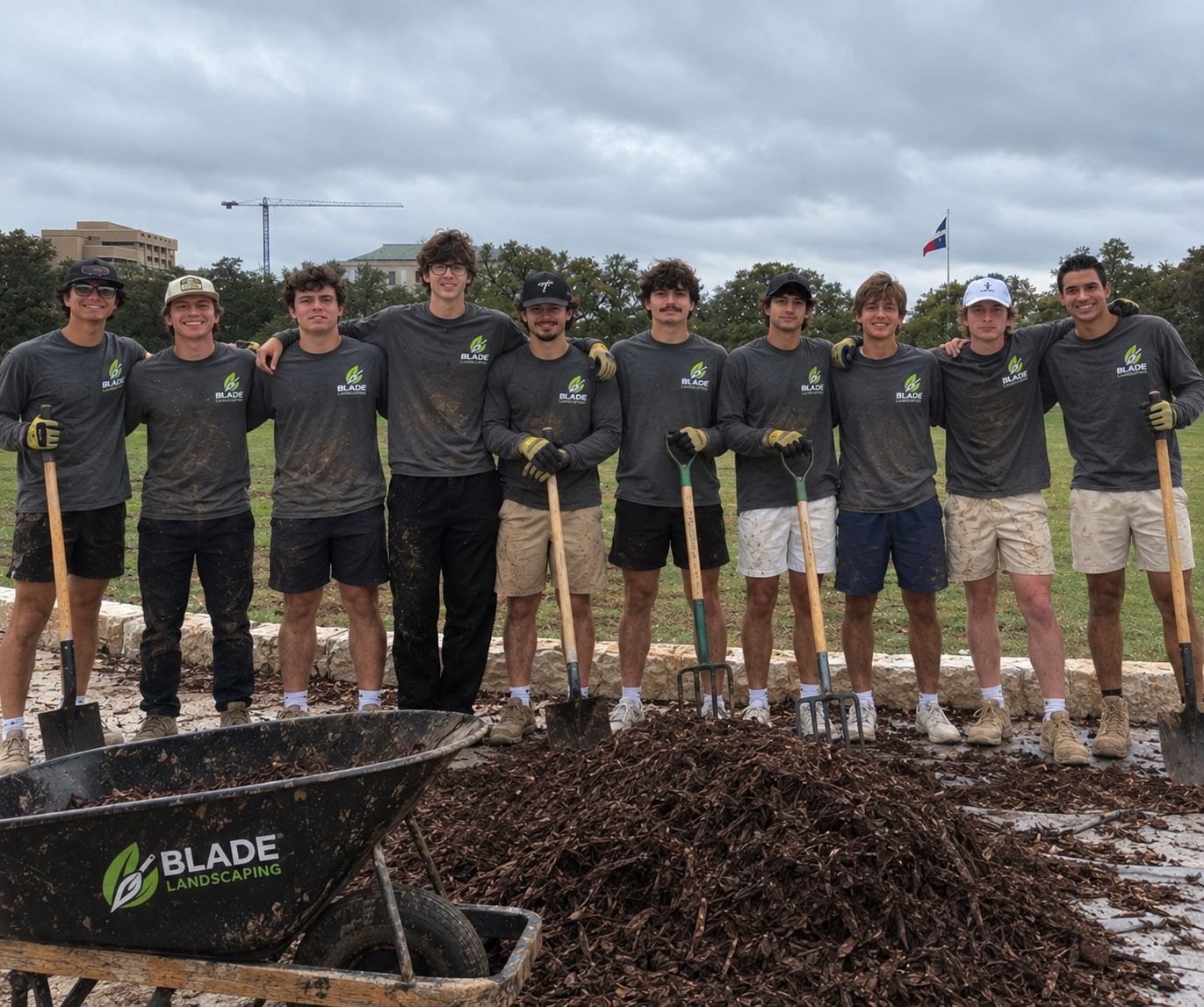 Blade Landscaping student crew with tools at a mulching job